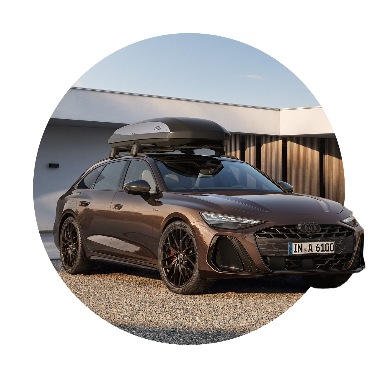 The picture shows an Audi with a roof box installed.